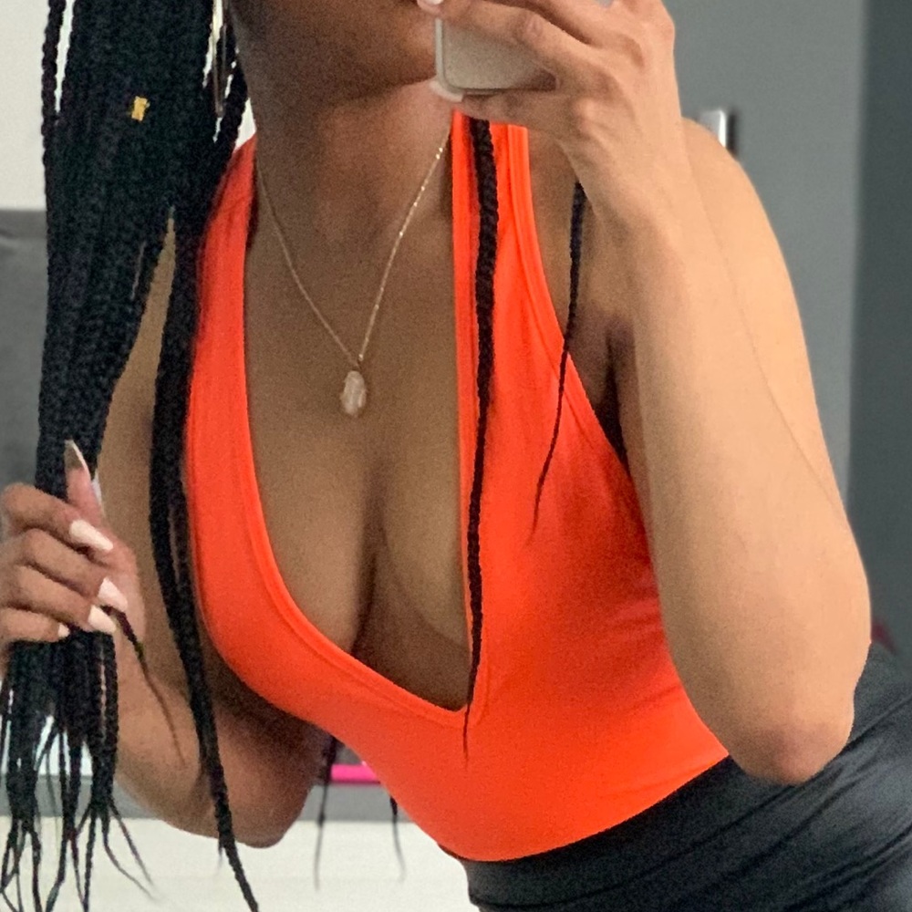 Neon orange racerback bodysuit